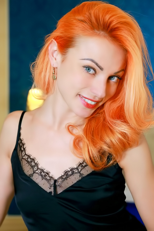 Petite pixie with orange hair