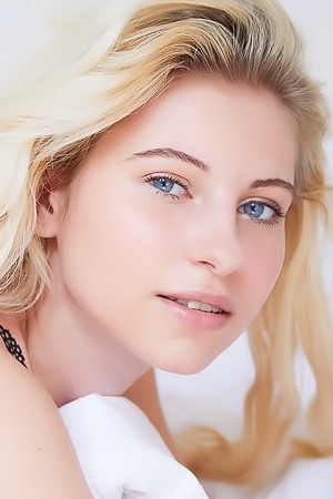 Lilly Bella Caressing Her Lovely Breasts And Tugging Her Panties Aside