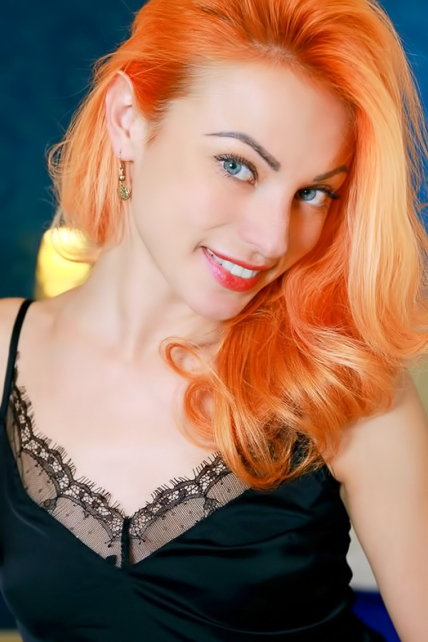 Petite pixie with orange hair