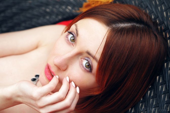 Artistic redhead loves to get naked photo 10