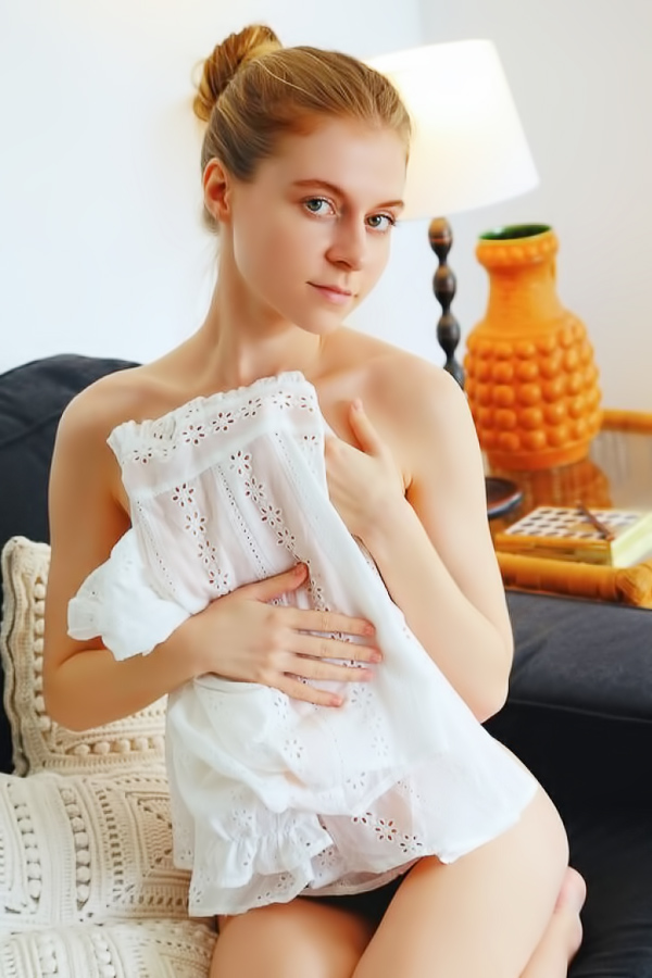 Girl next door with a shaved pussy