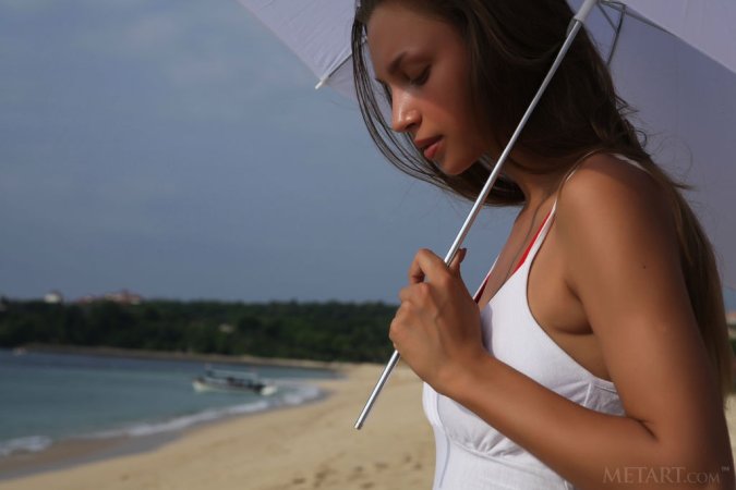 She loves sand on her pussy photo 7