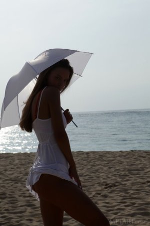 She loves sand on her pussy photo 15