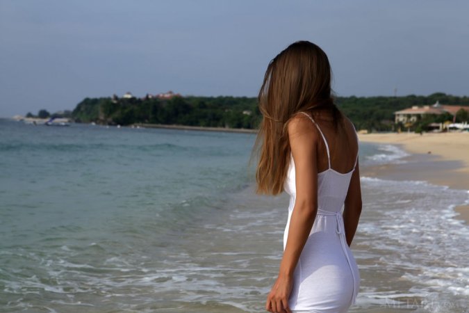 She loves sand on her pussy photo 17