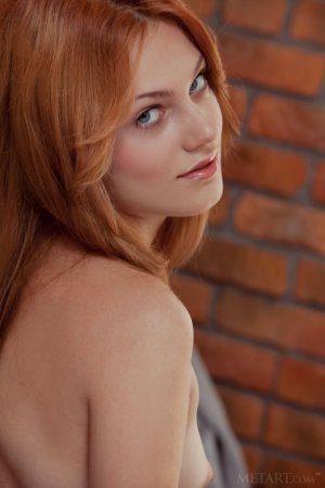 Beautiful redhead takes it all off photo 9