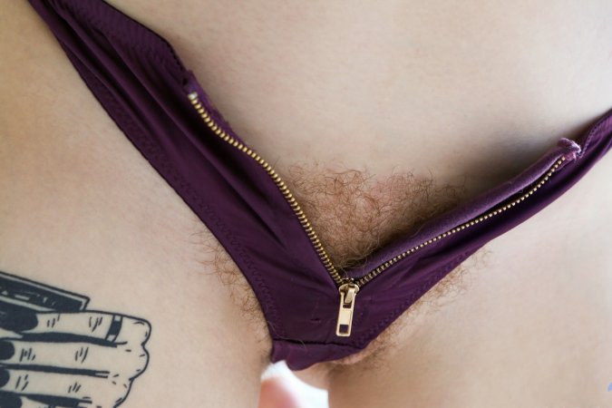 Redhead babe with a hairy cunt photo 11