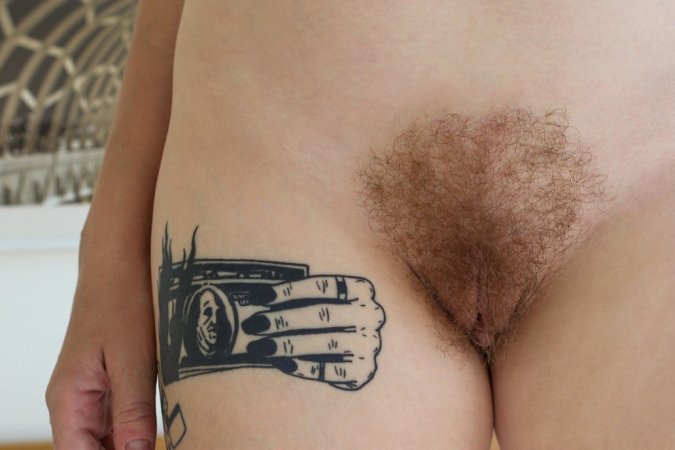 Redhead babe with a hairy cunt photo 12