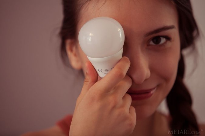 Changing a light bulb in the nude photo 17