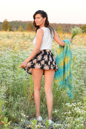 Cute babe likes to pose outdoors photo 14