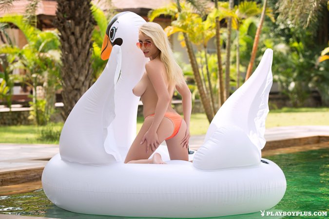 Getting naked to try out the pool toy photo 17