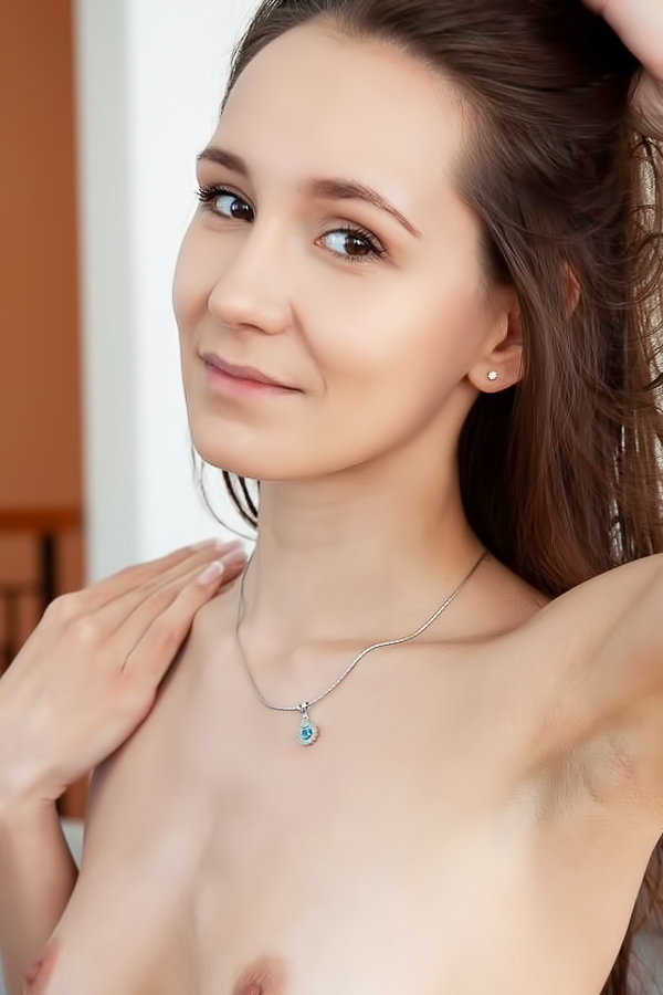 Megan Muse – Brunette pleases pussy on comfy couch